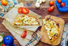 피자 스톡 사진 502815332 | iStock pieces of pizza on a cutting board, top view