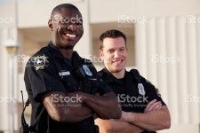 Police Officers stock photo 468740573 | iStock Multi-ethnic police officers . Focus on African American man.