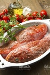 레드피시 스톡 사진 177442028 | iStock Redfish with tomatoes, parsley, garlic and olve oil