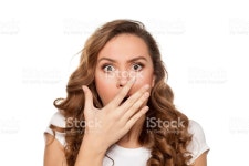 Shocked Woman stock photo 512296986 | iStock beautiful and shocked young woman holding her hand over her mouth on...