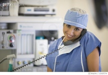 124205741 | 게티이미지코리아 | Hispanic doctor using telephone in hospital Royalty-Free 이미지