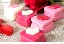 700819549 | 게티이미지코리아 | High Angle View Of Heart Shape Desserts On Wooden Table Royalty-Free 이미지