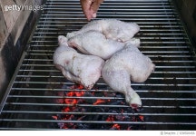 639500456 | 게티이미지코리아 | Cooking chicken on barbeque grill Royalty-Free 이미지
