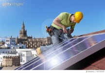 700720565 | 게티이미지코리아 | Engineer Fitting Solar Panels To Roof Of House Royalty-Free 이미지