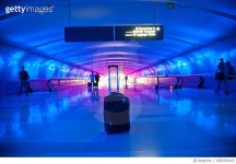 685009443 | 게티이미지코리아 | Abandoned suitcase in blue airport terminal Royalty-Free 이미지