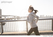 656855846 | 게티이미지코리아 | Young female runner running happily Royalty-Free 이미지