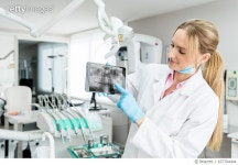 657784444 | 게티이미지코리아 | The dental x-ray image on touchpad Royalty-Free 이미지