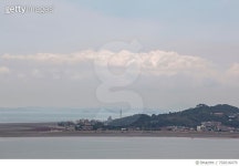 702616079 | 게티이미지코리아 | Sea By Daebudo Island Against Cloudy Sky Royalty-Free 이미지
