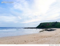 705207901 | 게티이미지코리아 | Scenic View Of Beach At Phillip Island Against Sky Royalty-Free 이미지