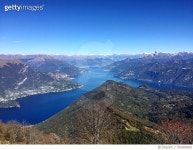 705309059 | 게티이미지코리아 | Scenic View Of Lake And Mountains Against Clear Blue Sky Royalty-Free 이미지