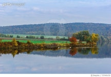 707499159 | 게티이미지코리아 | Scenic View Of Calm Lake By Landscape Against Sky Royalty-Free 이미지