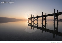 709139703 | 게티이미지코리아 | Germany, Reichenau Island, wooden boardwalk at twilight Royalty-Free 이미지