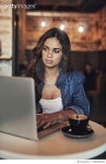 660260876 | 게티이미지코리아 | Coffee is her favourite coworker Royalty-Free 이미지