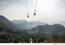 713847039 | 게티이미지코리아 | View Of Overhead Cable Car Over Mountains Against Sky Royalty-Free 이미지
