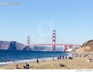 713847153 | 게티이미지코리아 | Tourists On Beach Against Blue Sky Royalty-Free 이미지