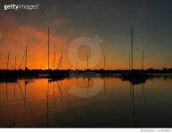 713935849 | 게티이미지코리아 | Sailboats In Calm Sea At Sunset Royalty-Free 이미지