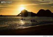 713943501 | 게티이미지코리아 | View Of Calm Beach At Sunset Royalty-Free 이미지