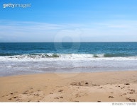 717263589 | 게티이미지코리아 | View Of Calm Beach Against Blue Sky Royalty-Free 이미지
