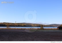 717314713 | 게티이미지코리아 | Calm Countryside Lake Against Mountain Range Royalty-Free 이미지