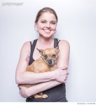 672581988 | 게티이미지코리아 | Young woman holding dog Royalty-Free 이미지