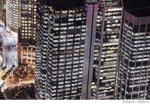 658966710 | 게티이미지코리아 | Aerial view of offices in Sydney illuminated at night Royalty-Free 이미지