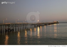 722358693 | 게티이미지코리아 | Pier In Sea At Night Royalty-Free 이미지