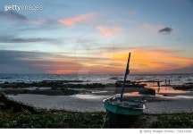 724311601 | 게티이미지코리아 | Boat Moored On Sea Against Sky During Sunset Royalty-Free 이미지