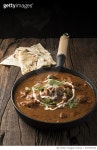679705436 | 게티이미지코리아 | Chicken Curry In An Iron Pan. Royalty-Free 이미지