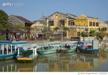 723503655 | 게티이미지코리아 | Tourist boats on Thu Bon River and historic buildings, Hoi An (UNESCO World Heritage Site)... 