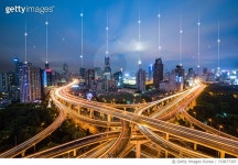 719877307 | 게티이미지코리아 | Aerial view of road intersection and city skyscrapers at night,  Lujiazui, Shanghai, China... 