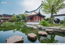 719877473 | 게티이미지코리아 | Chinese buildings reflecting in pond, Suzhou, China Royalty-Free 이미지