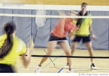 691337912 | 게티이미지코리아 | Blurred badminton players on the court Royalty-Free 이미지