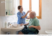 693224624 | 게티이미지코리아 | Home Caregiver with senior man in bathroom Royalty-Free 이미지