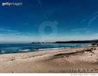 730290017 | 게티이미지코리아 | Scenic View Of Beach Against Blue Sky Royalty-Free 이미지