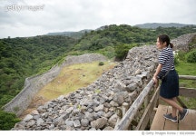 692100094 | 게티이미지코리아 | A Woman at Nakijin Castle, Okinawa, Japan Royalty-Free 이미지