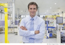 730133825 | 게티이미지코리아 | Businessman In Solar Panel Manufacturing Plant Royalty-Free 이미지