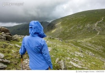 694050560 | 게티이미지코리아 | Lone hiker contemplating scenic mountain view Rights-Managed 이미지
