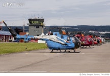 730145409 | 게티이미지코리아 | A line-up of 5 special colored Bo-105 helicopters of the German Army. Royalty-Free 이미지