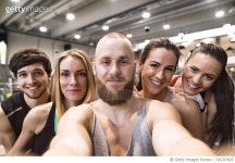 726797825 | 게티이미지코리아 | Young athletes having fun in the gym, taking selfies Royalty-Free 이미지