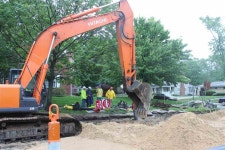 Grand Haven Tribune: 			Crews work to repair water main break on Grand Ave.		 Crews work to repair water main break on Grand Ave.
