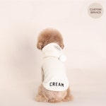 OOPSIE DAISY 웁시데이지 [OOPSIE DAISY] NAME HOODIE_IVORY