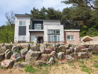 초당동의 해변 바로 앞 휴가지 숙소 | 에어비앤비
