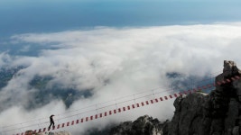 Person Walking Rope Bridge, Aerial 스톡 동영상 비디오(100% 로열티 프리) 1045240618 | Shutterstock