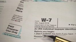 Form W-7 Application for Irs 스톡 동영상 비디오(100% 로열티 프리) 1067077384 | Shutterstock
