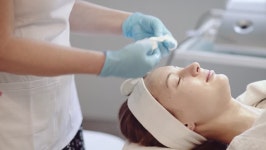 Young Woman Getting a Cosmetic 스톡 동영상 비디오(100% 로열티 프리) 15624595 | Shutterstock