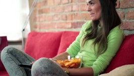 Young Woman Eating Chips and 스톡 동영상 비디오(100% 로열티 프리) 4820033 | Shutterstock