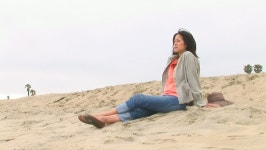 Young Woman Sitting On Sand 스톡 동영상 비디오(100% 로열티 프리) 877003 | Shutterstock