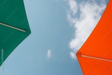 Two Colourful Sunshade Umbrellas Stock Photo | Adobe Stock Two Colourful Sunshade Umbrellas Stock Photo