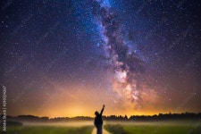 Landscape with Milky way galaxy and man silhuette pointing to the stars Stock Photo | Adobe Stock Landscape with Milky way galaxy... 