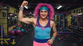 Energetic 80s Fitness Instructor Positively Posing with Muscular Confidence in Gym Stock Video | Adobe Stock Energetic 80s... 